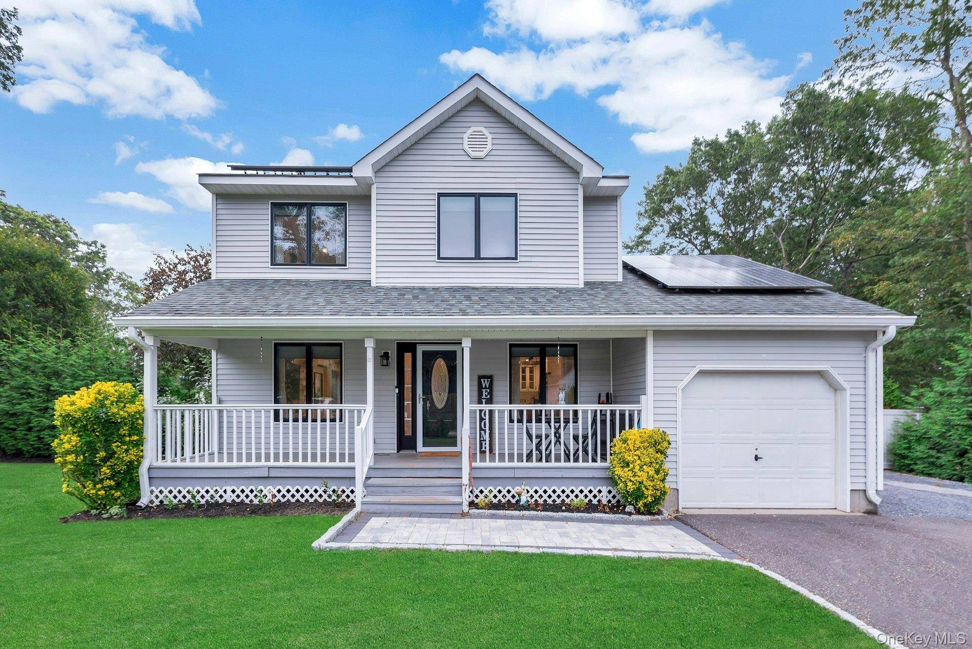Enter this bright, open floor plan that seamlessly blends the kitchen, dining, and living areas, creating a warm and inviting atmosphere.