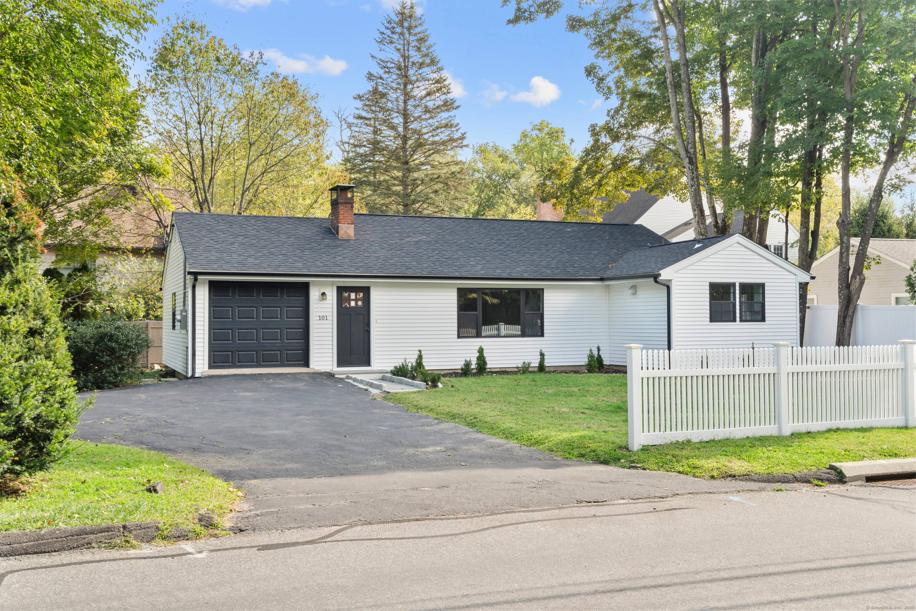Welcome to 101 Parade Hill, a newly fenced masterpiece of modern design in the prestigious town of New Canaan, CT.