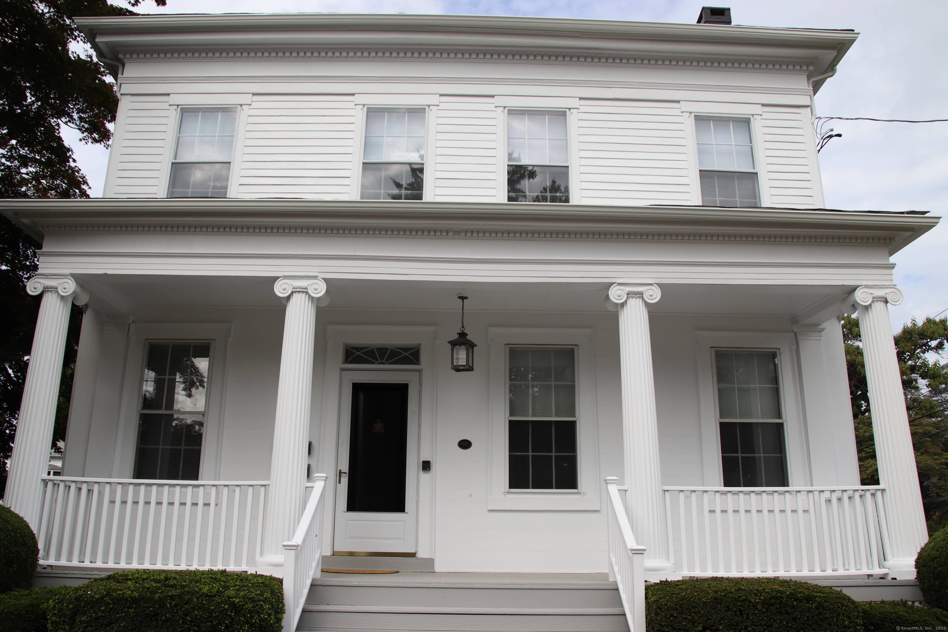 Nestled in the heart of the Milford Historic District, this beautifully updated second floor unit perfectly blends historic elegance with modern convenience.
