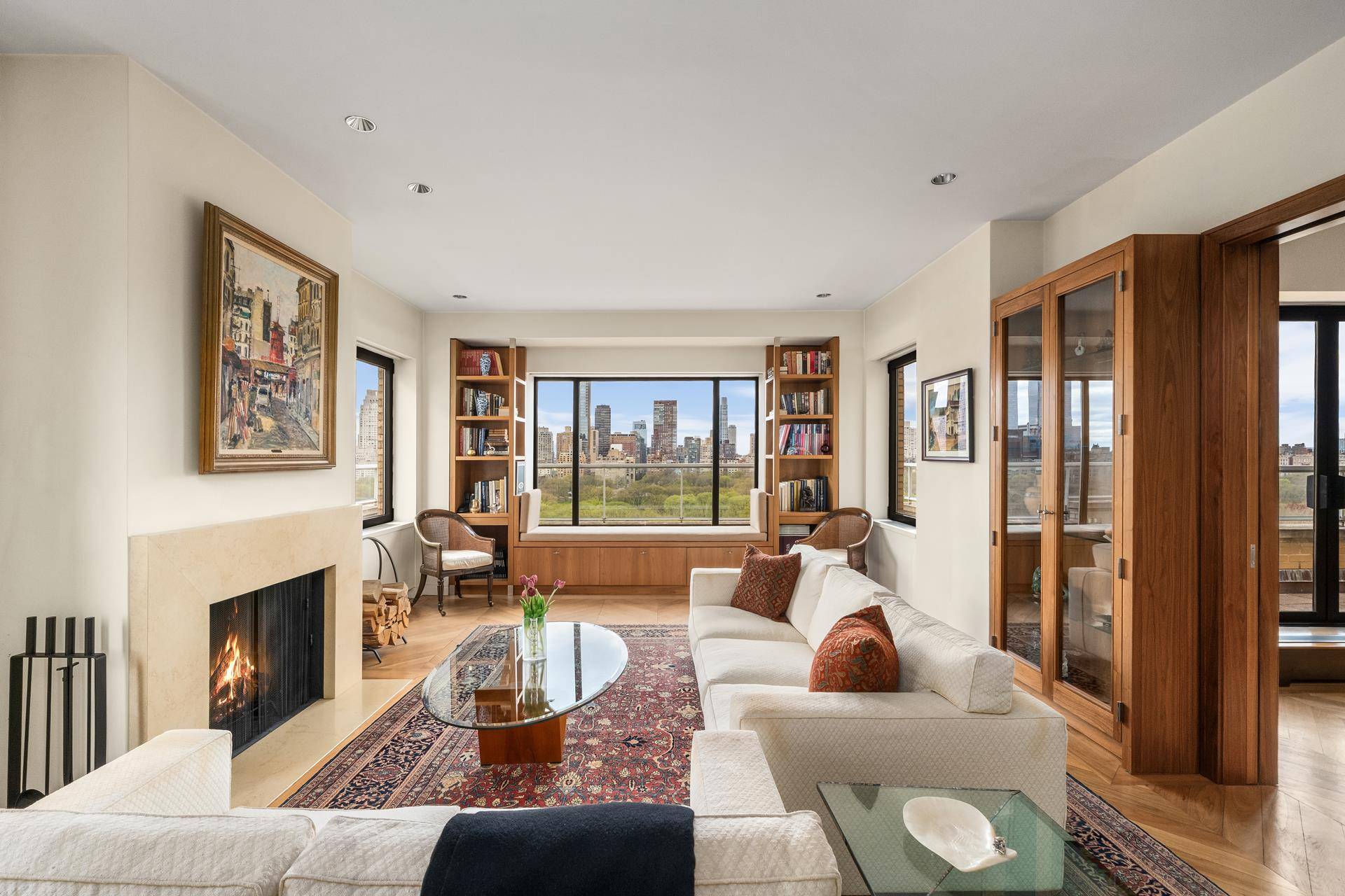 Perched atop the 20th and 21st floors of a premier Fifth Avenue cooperative, this grand, sun flooded 11 room duplex penthouse offers panoramic Central Park views, refined interiors, high ceilings, ...