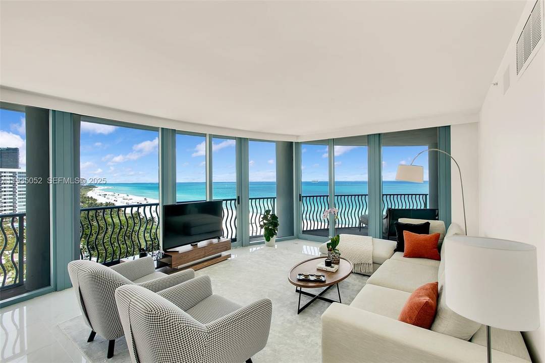 Direct Ocean 3 Bed 3. 5 Bath corner residence at the award winner Michael Graves Condo.