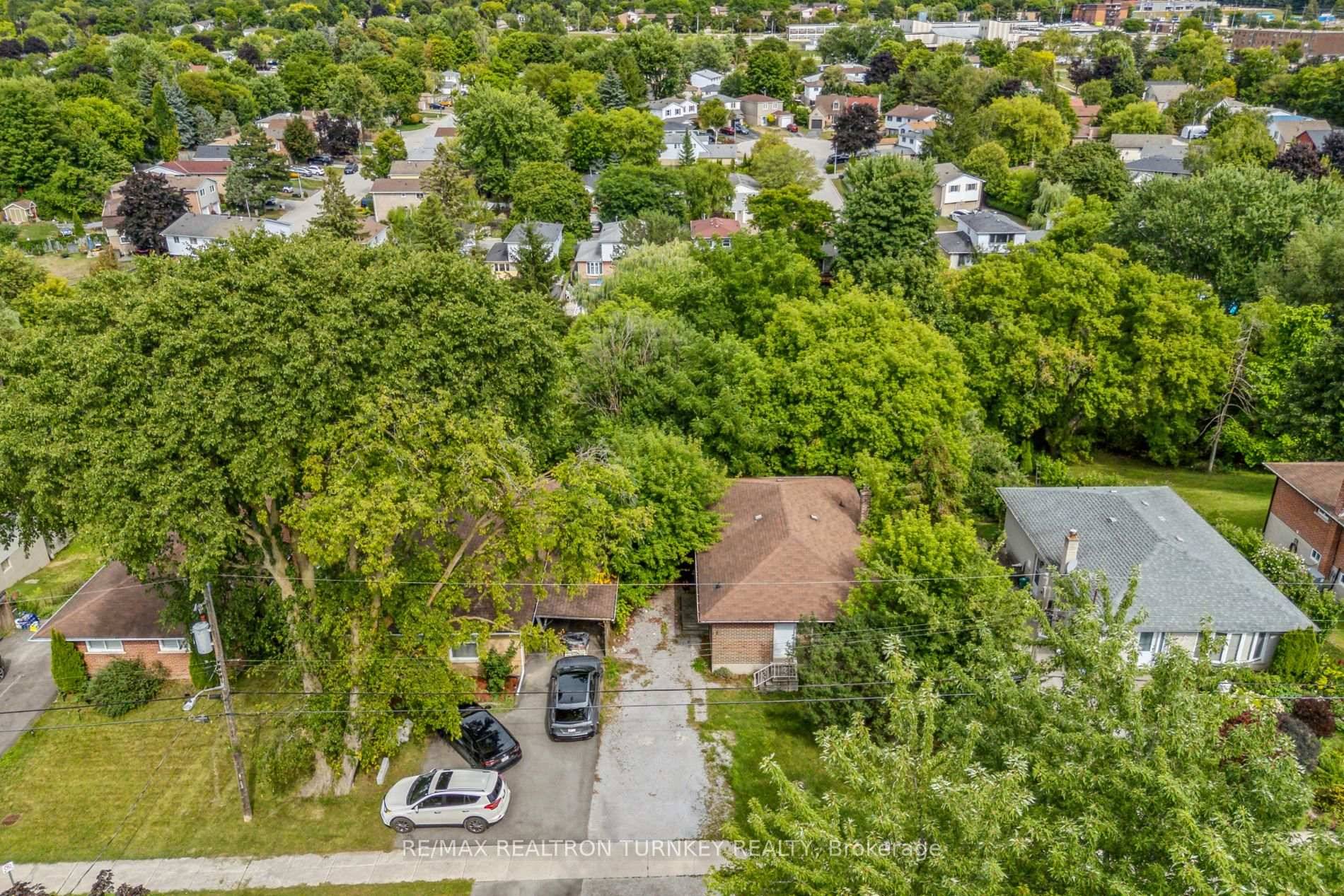 Spacious, Detached Brick Bungalow nestled on a Premium Ravine Lot 50 x 150' with Separate Entrance to Bright Walk Out basement !