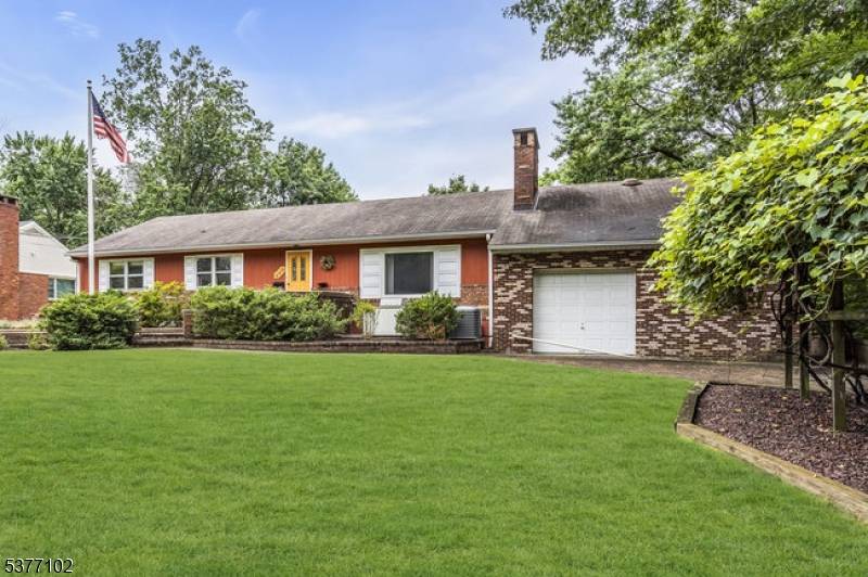 Architecturally Inspired Mid Century Brick Ranch.