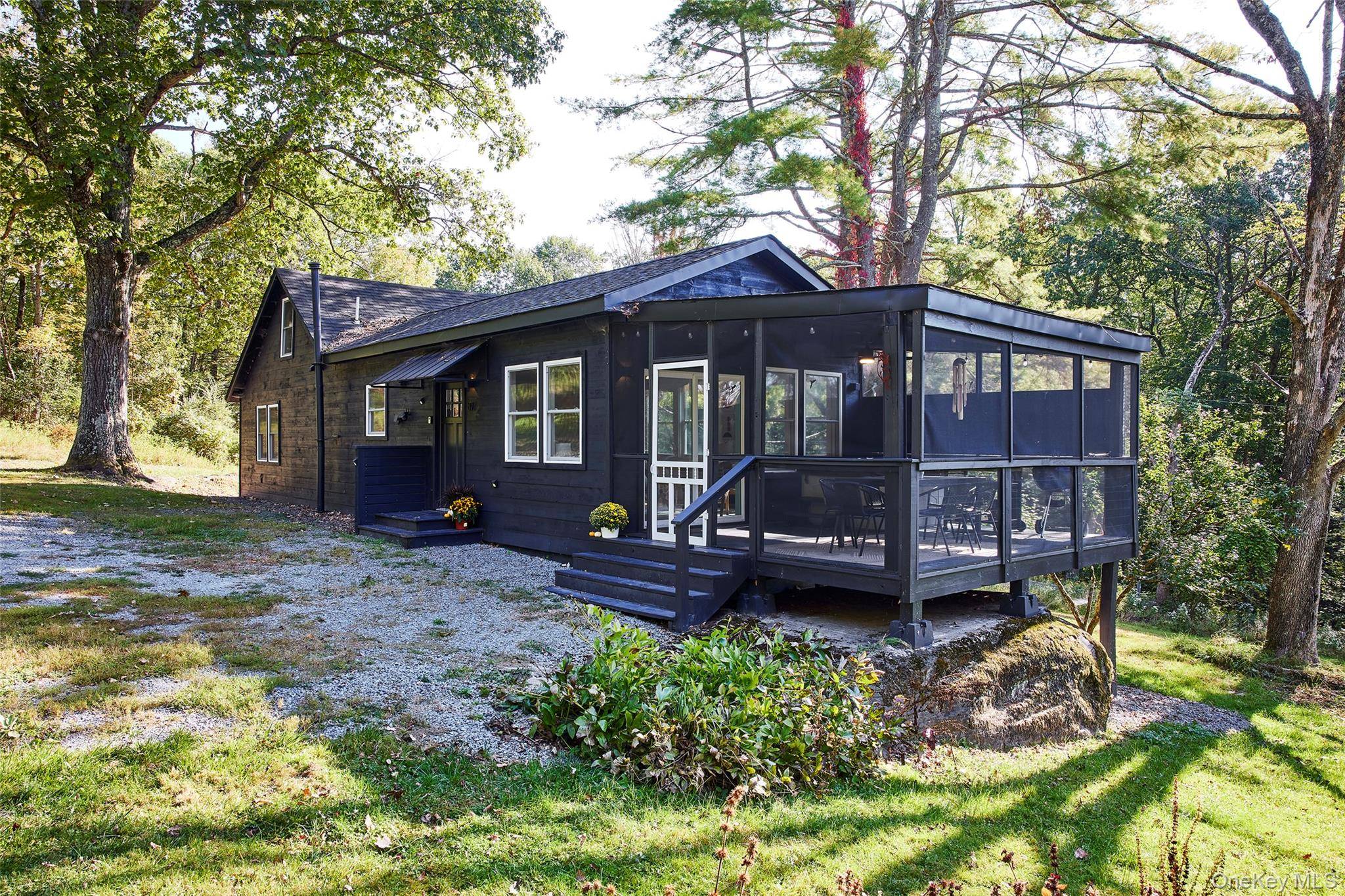 Oak Ridge is a turnkey country cottage being sold fully furnished, with thoughtful interiors, abundant natural light, and updates throughout.