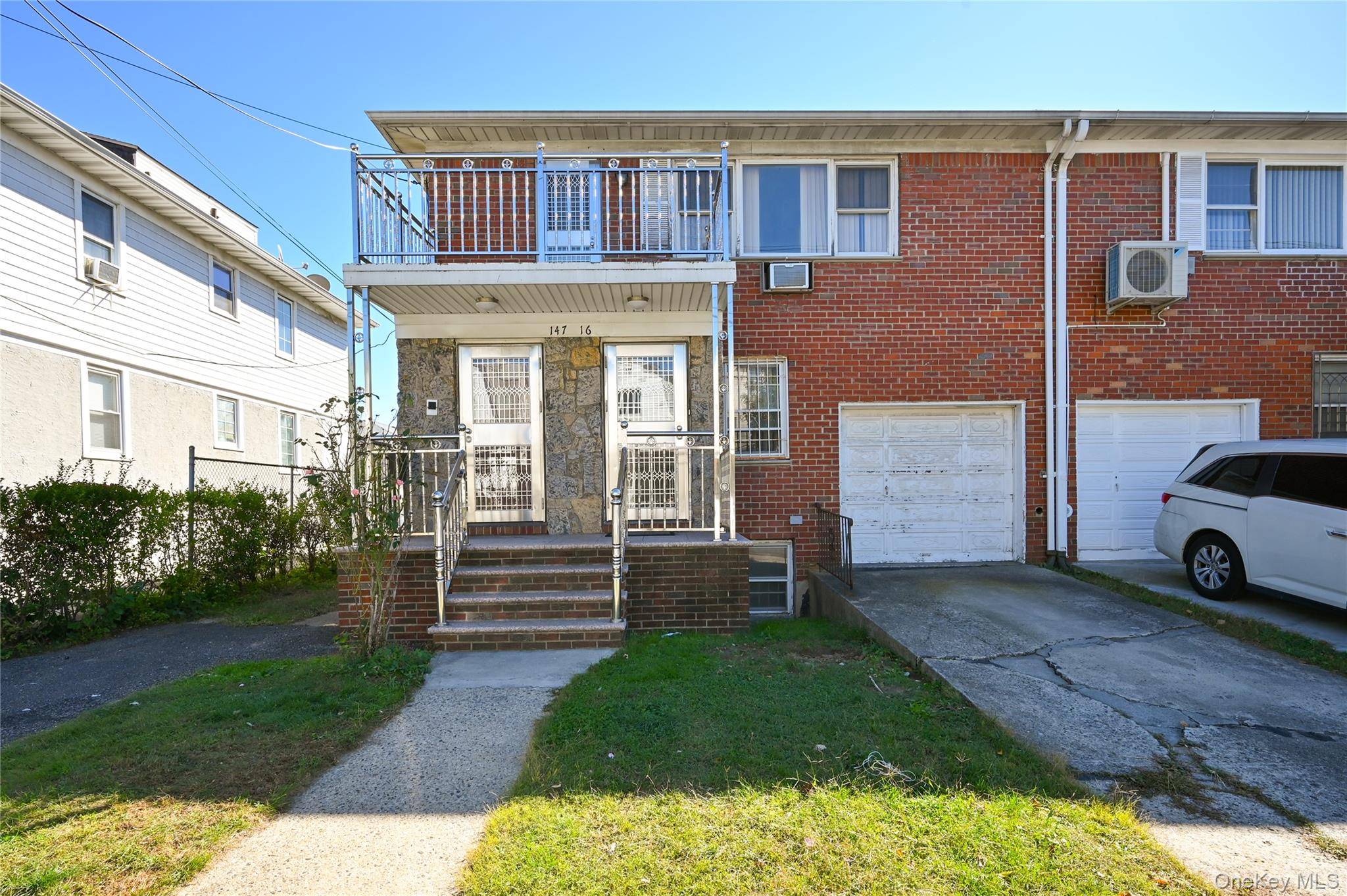 Welcome to this semi detached legal 2 family home ideally situated in the heart of Flushing.