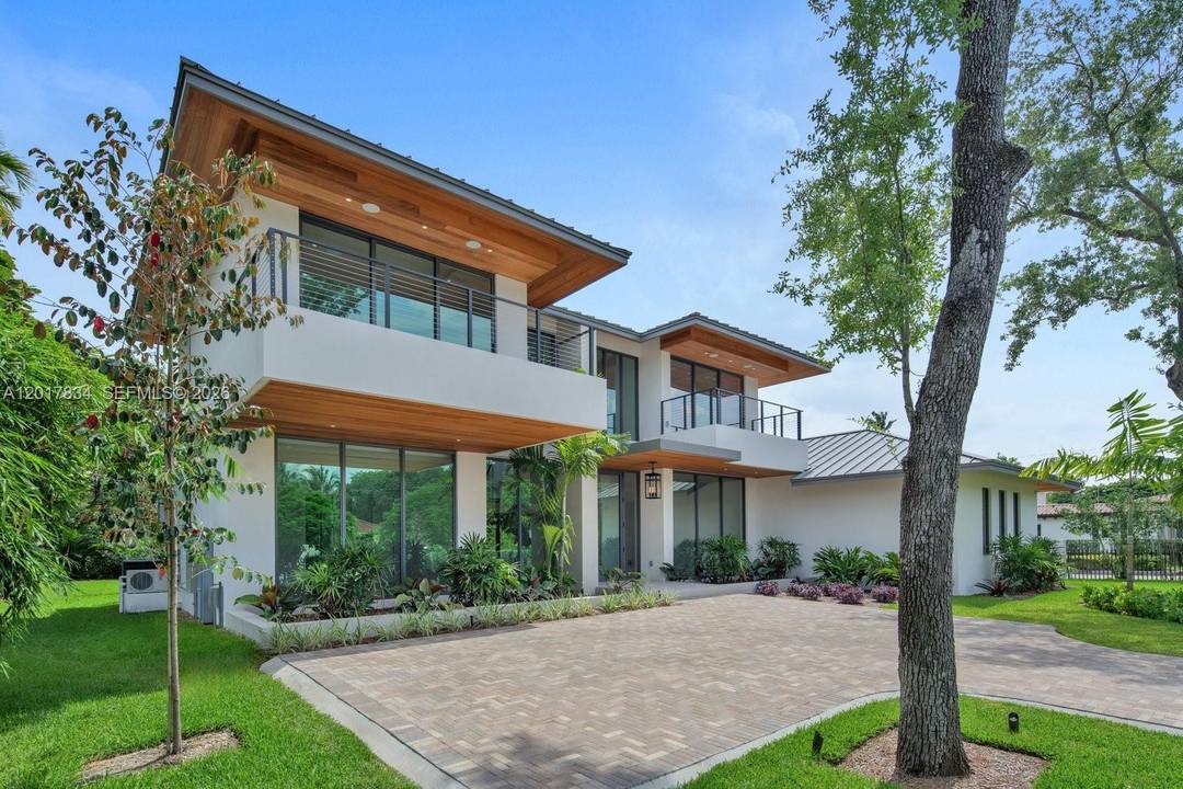 Experience elevated tropical modern living in this newly constructed South Miami residence offering 6, 426 total SF with 5 bedrooms, 5.