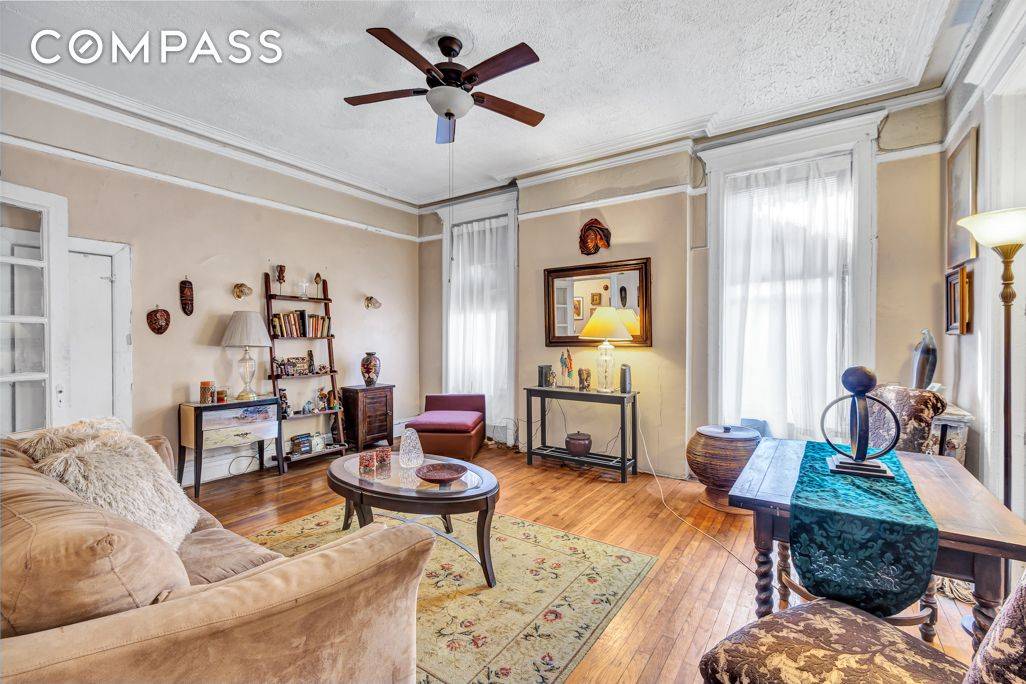 This classic prewar home overlooking Marcus Garvey Park is filled with character, wonderful light, and soaring 10 foot ceilings.