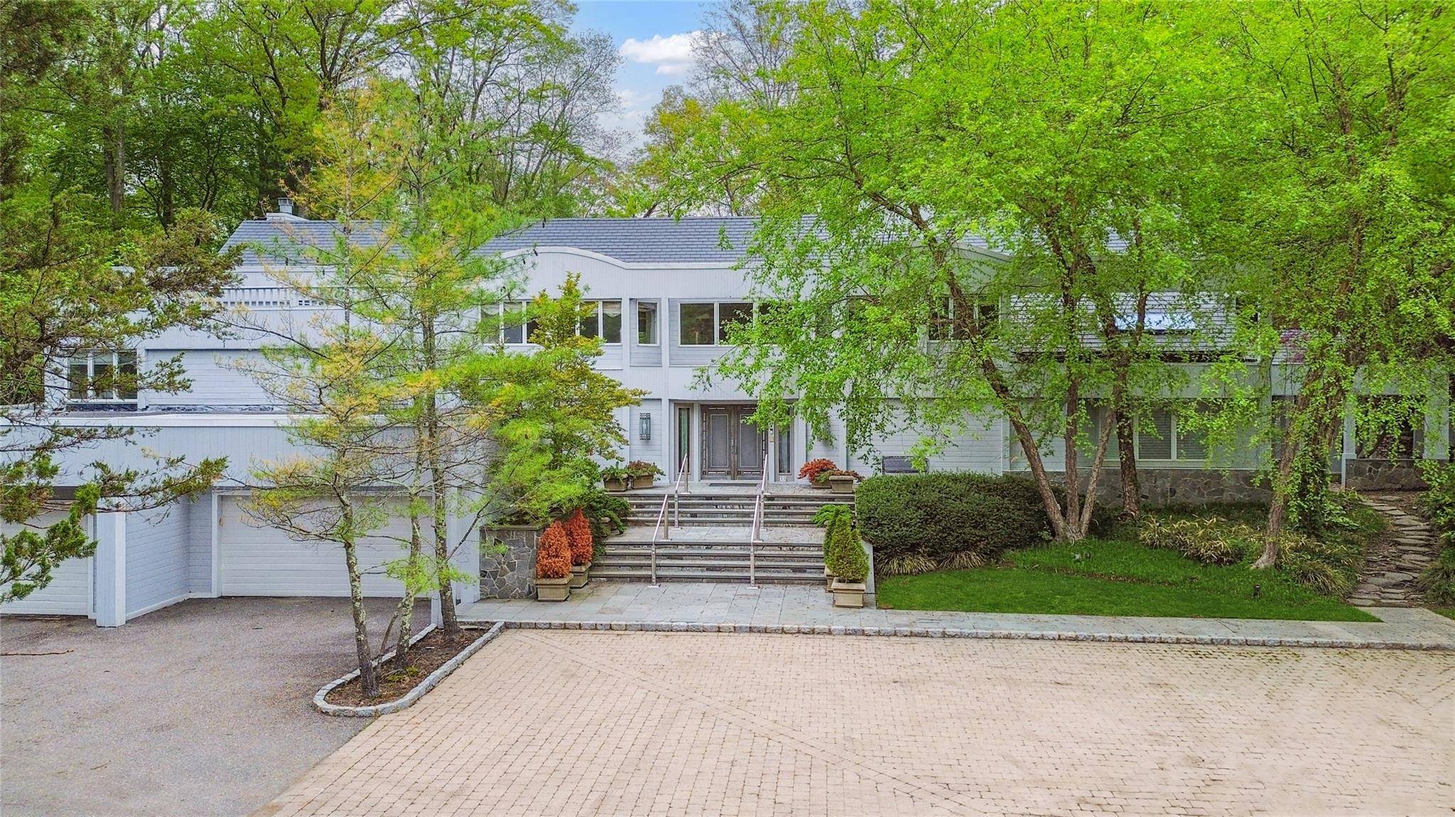 Old Brookville Contemporary Home Stunning and serene property backing lush nature preserve 80 Valentines Lane offers pure peace and privacy on Long Island's Gold Coast.