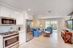 ENJOY WINTER MONTHS IN THIS UPDATED TOWNHOME IN DOWNTOWN DELRAY BEACH.