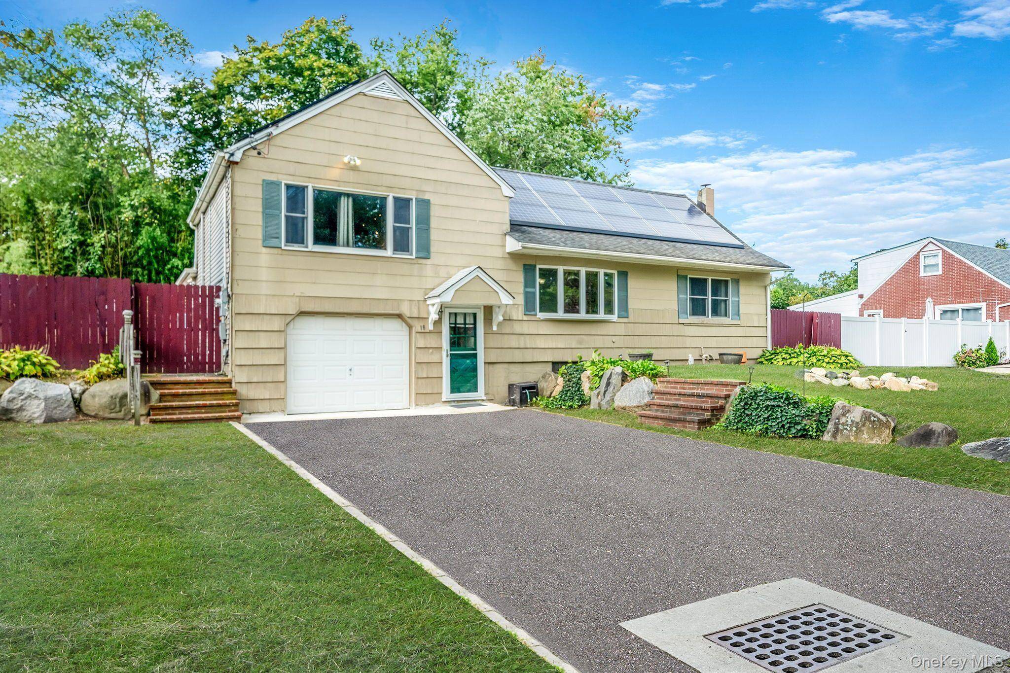 Welcome to 18 Lakeview Drive a beautifully maintained 4 bedroom, 2 bath ranch located in a peaceful neighborhood of Middle Island.