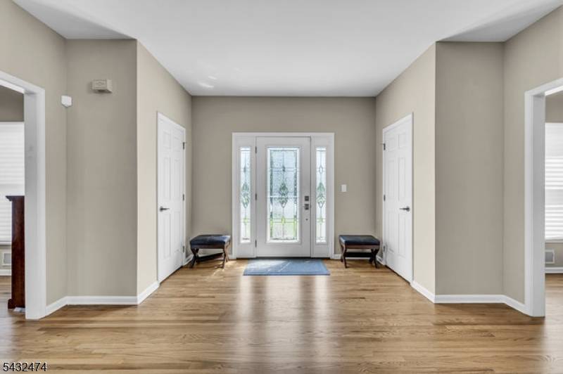 Sprawling center hall colonial nestled on slightly over 2 private acres at the end of a quiet cul de sac !