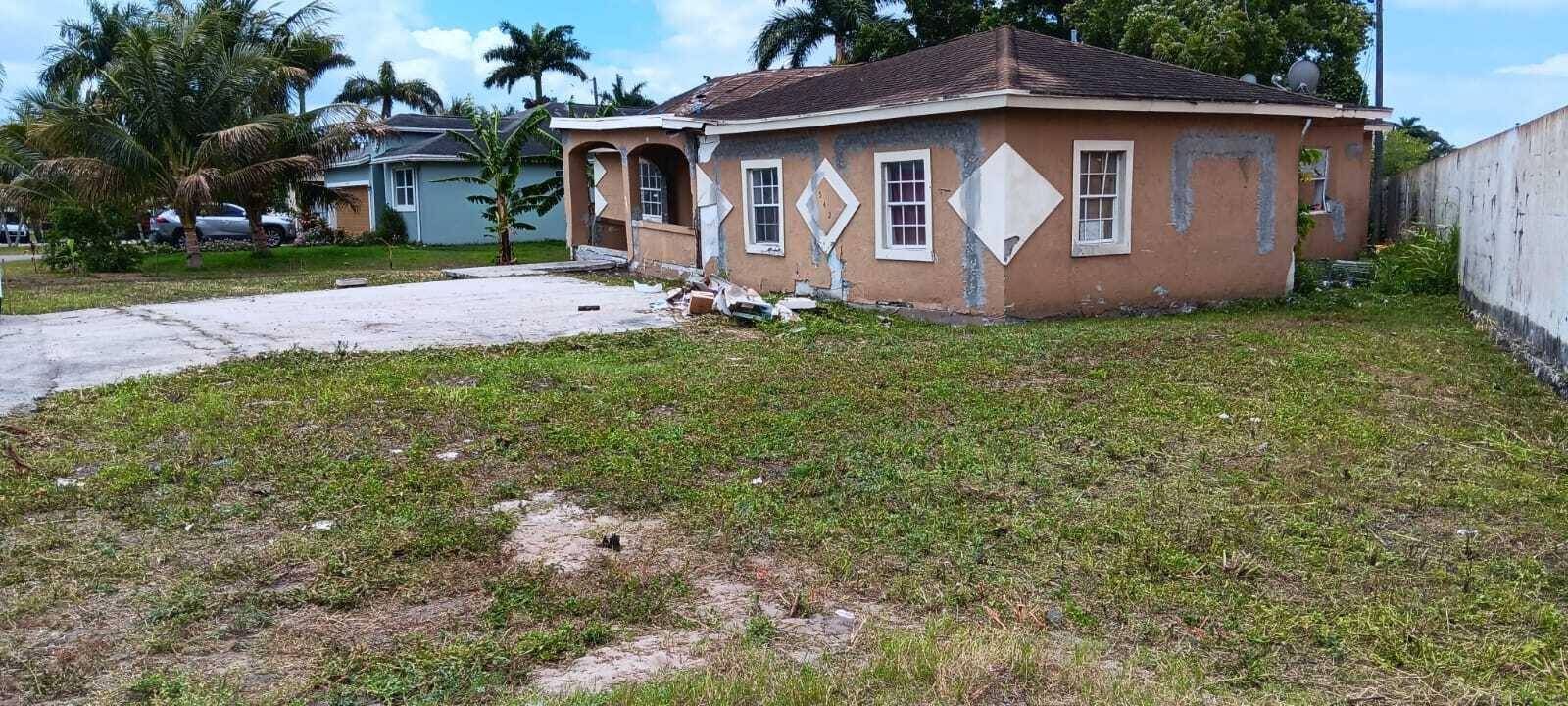 This home is in a good neighborhood but is sinking and may need to be demolished.