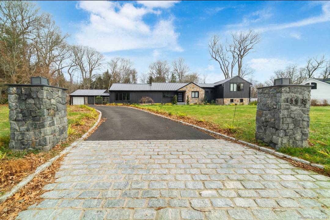 A beautifully renovated modern ranch set on a pristine acre in one of Stamford's most desirable neighborhoods.