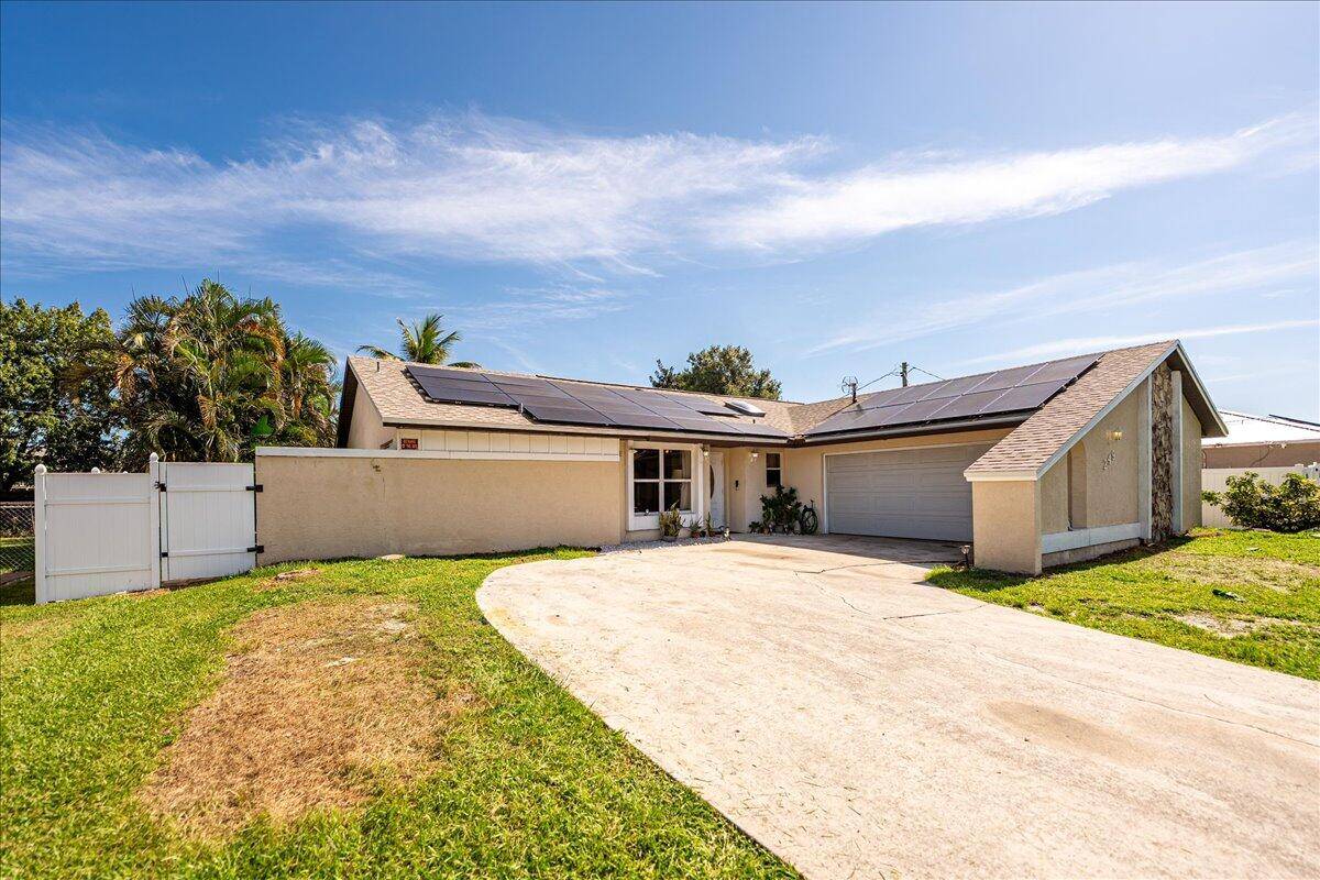 This beautifully finished 4 bedroom, 2 bath pool home offers the perfect blend of comfort, functionality, and location.