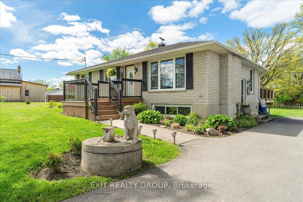 Charming 3 bed, 2 bath all brick bungalow, with an above ground pool, hot tub on an acre lot close to the Heritage Trails.