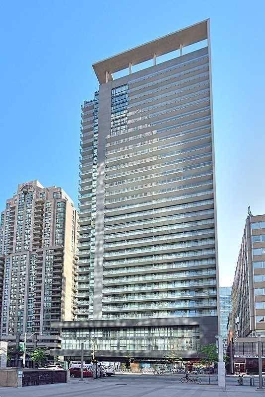 Lumiere On Bay Street, 1Bed Den Lightly Furnished Unit With Spacious Balcony, 9Ft Ceiling, Granite Kitchen With Back Splash, Hardwood Flooring.
