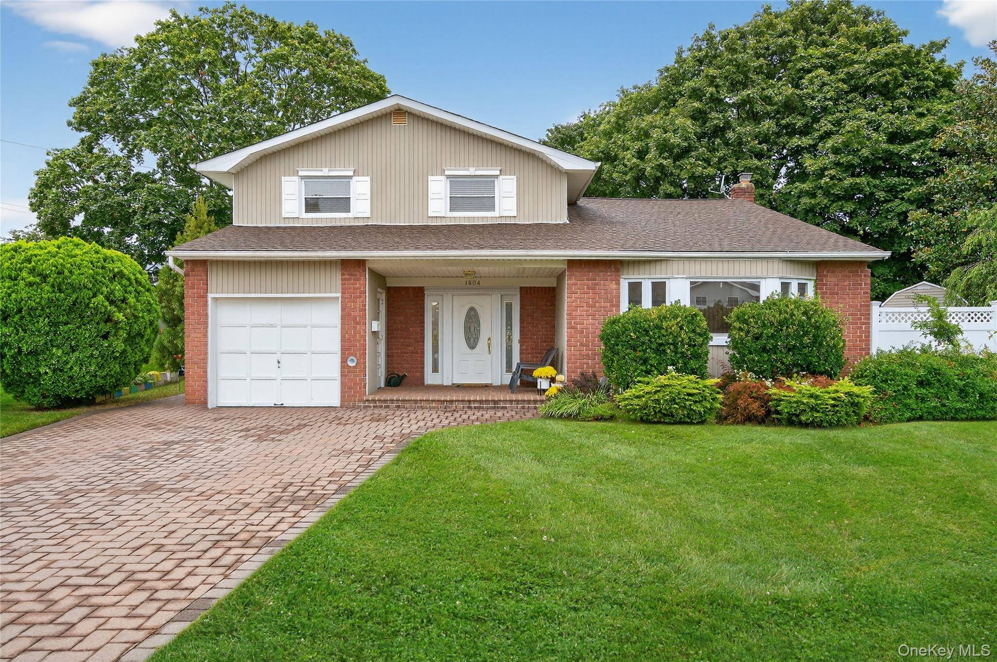 Welcome to this inviting Split Level style home, offering a wonderful blend of space and comfort.
