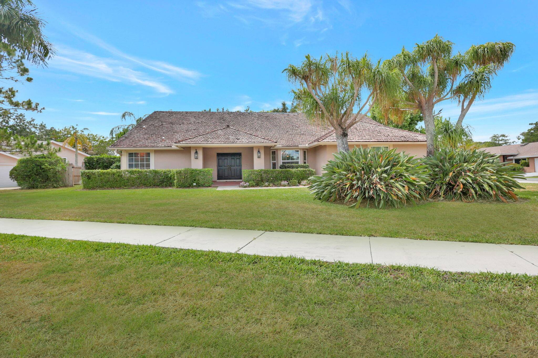 Spacious single story home on a large, private corner lot in a sought after neighborhood with top rated schools.