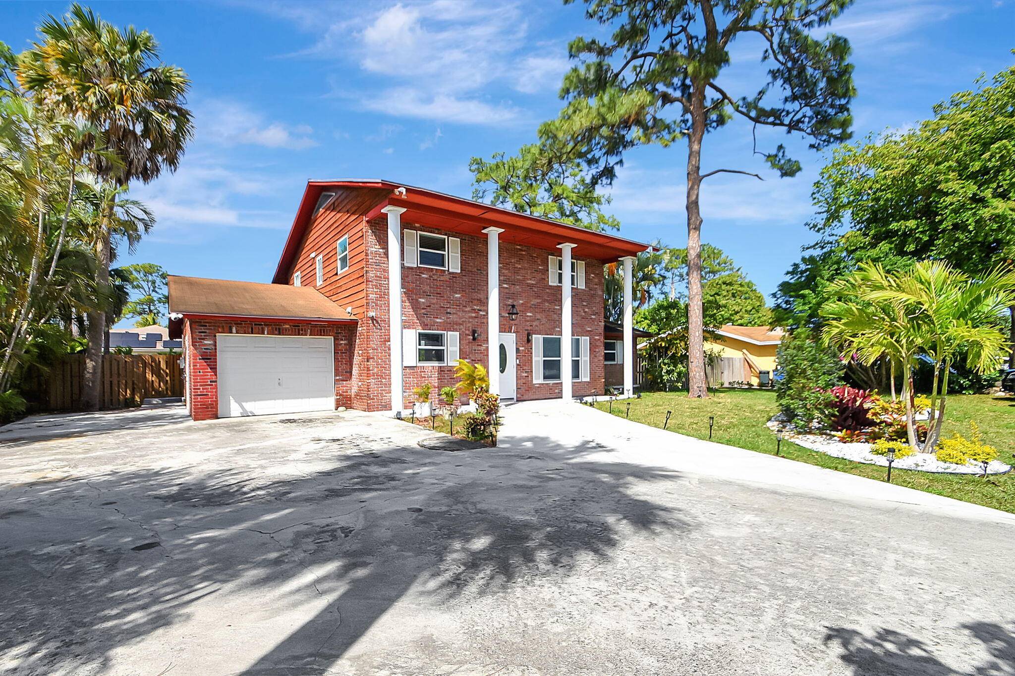 Welcome to this stunning contemporary residence boasting an expansive open floor plan, meticulously remodeled to perfection.