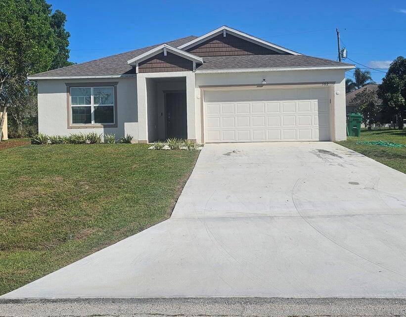 This beautiful home features 4 bedrooms and 2 bathrooms, including a spacious master suite with two walk in closets and dual sinks.