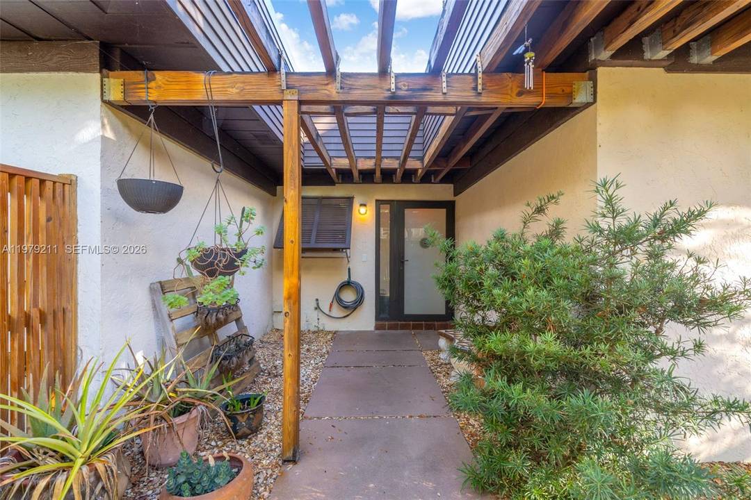 This inviting corner townhouse in Sheridan Oaks feels like home from the moment you arrive.