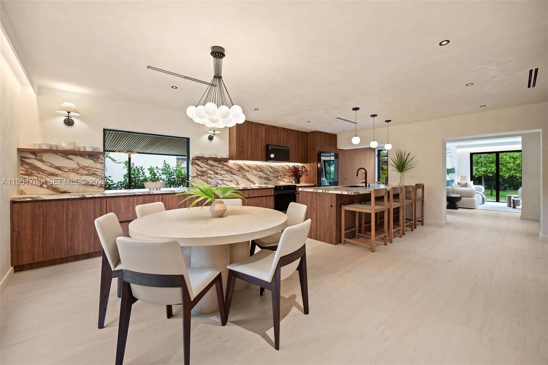 Step into modern luxury and thoughtful design in this beautifully renovated North Miami residence, where contemporary architecture and refined finishes create a bright, elevated living space.