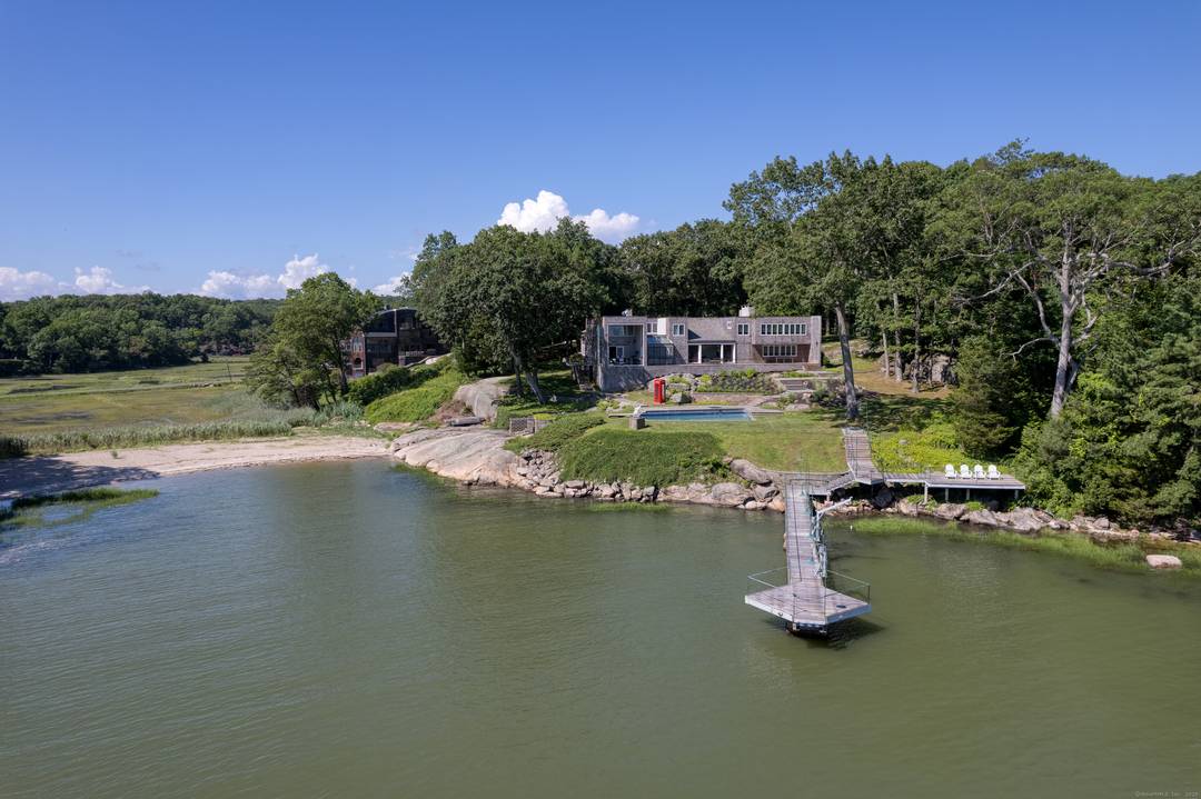 Exceptional Contemporary Direct Waterfront Estate.