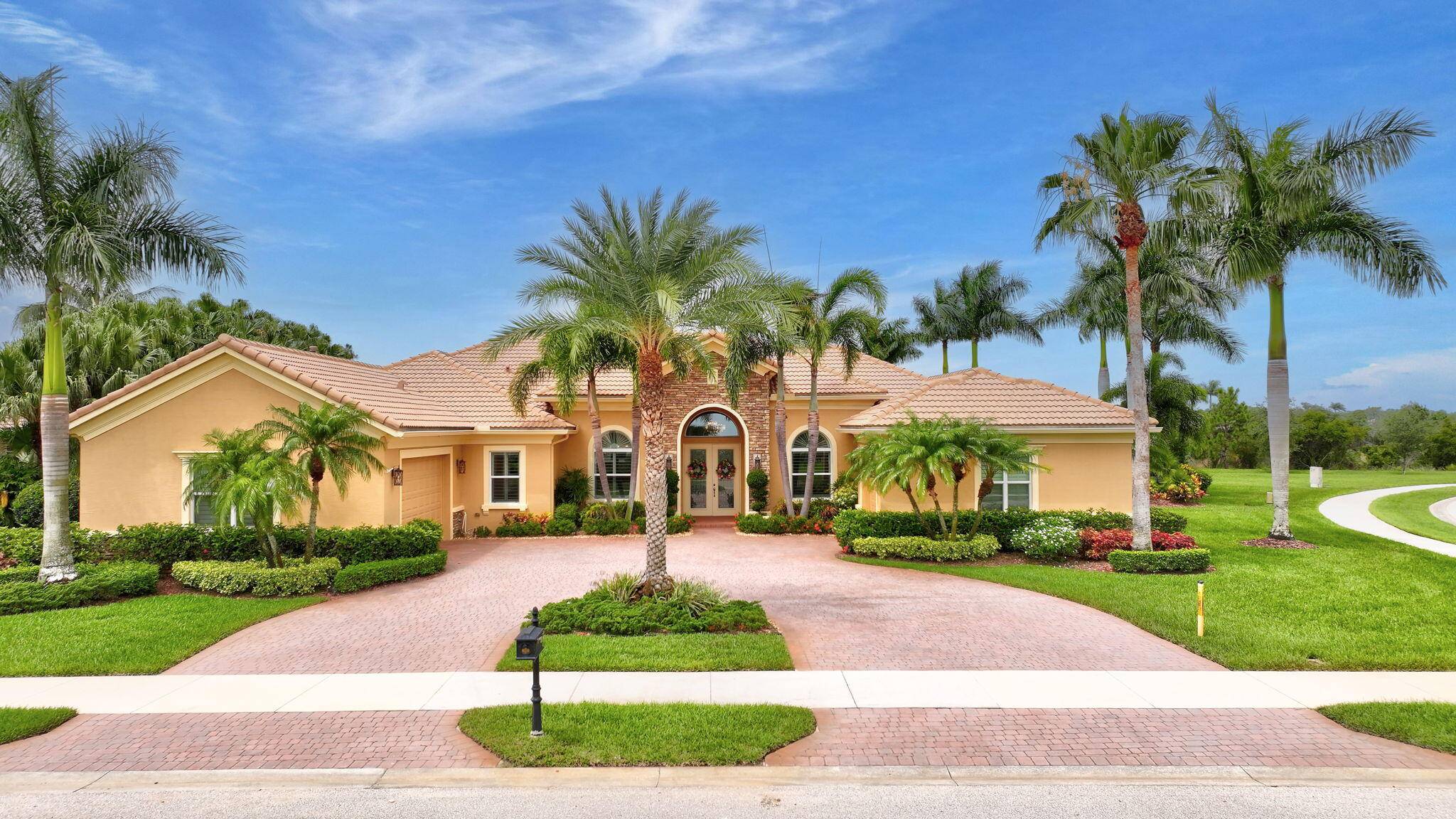 Impressive 5BR 4BA pool home with 3 car garage on a landscaped corner lot with preserve views in gated Tres Belle !