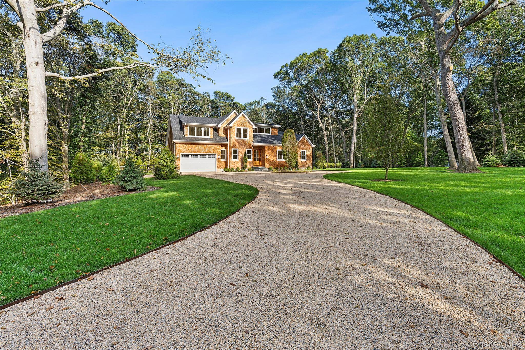 5697 Westphalia Road isn't just an address it's the moment where modern architecture meets the North Fork's easy rhythm.