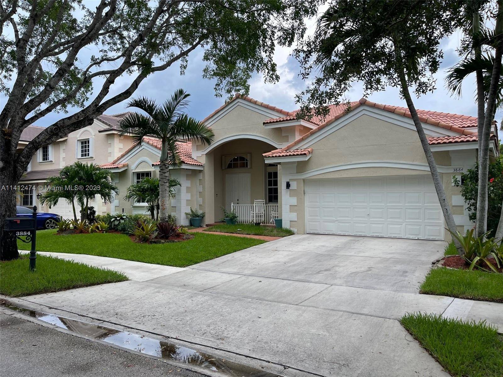 WELCOME HOME TO THE RIDGES, A HIGHLY DESIRABLE GATED COMMUNITY IN WESTON.