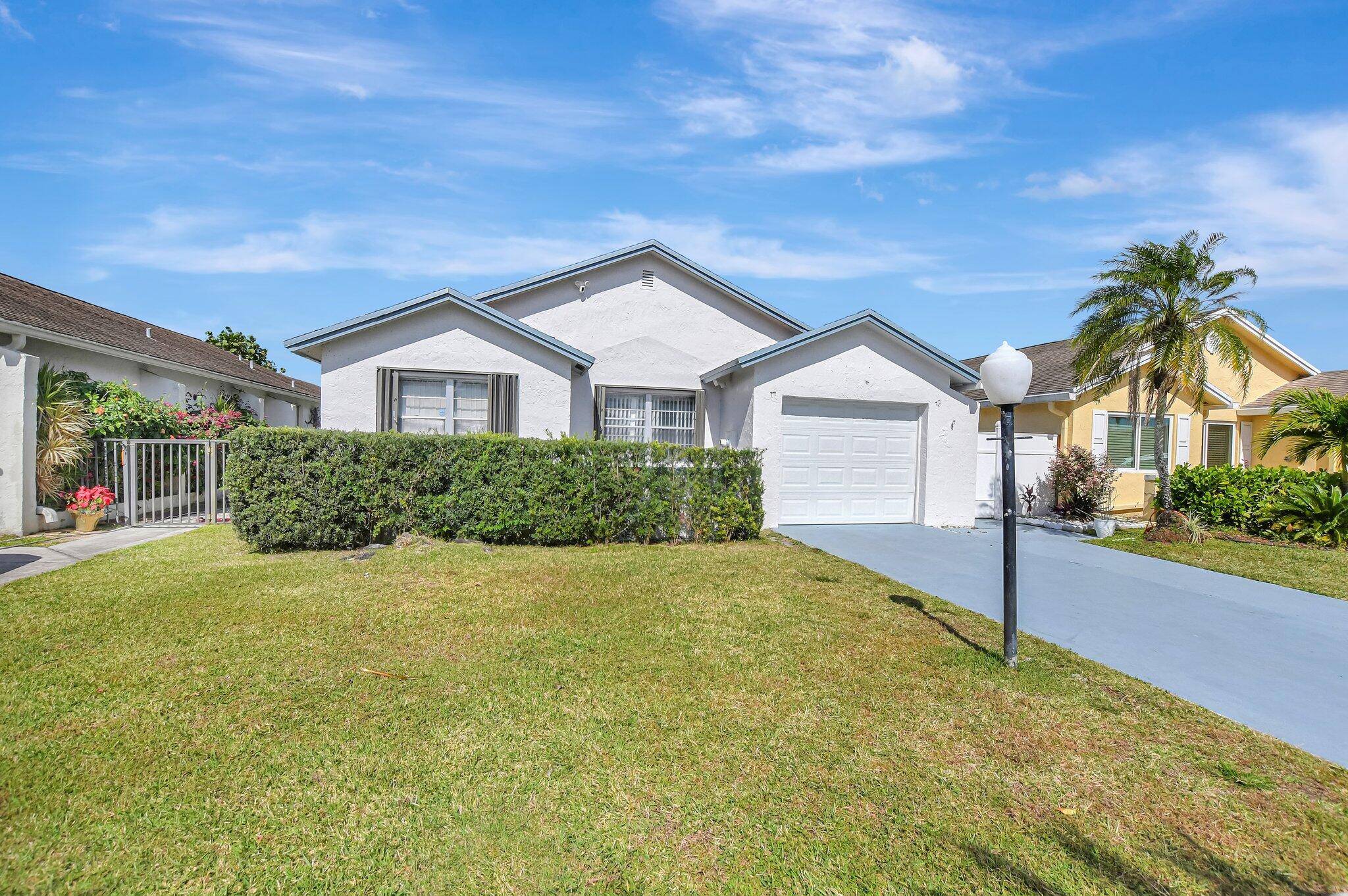 BEAUTIFUL WELL MAINTAINED THREE BEDROOM, TWO BATH AND ONE CARAGE WITH BEAUTIFUL LAKE VIEW.