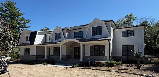 Welcome to this extraordinary Brand New Construction Hampton Style Colonial Home, nestled on two flat, beautifully landscaped acres in the prestigious Village of Lloyd Harbor !