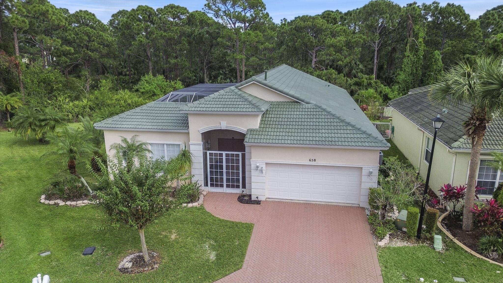 Fabulous Courtyard Pool Home with Brand New Roof !