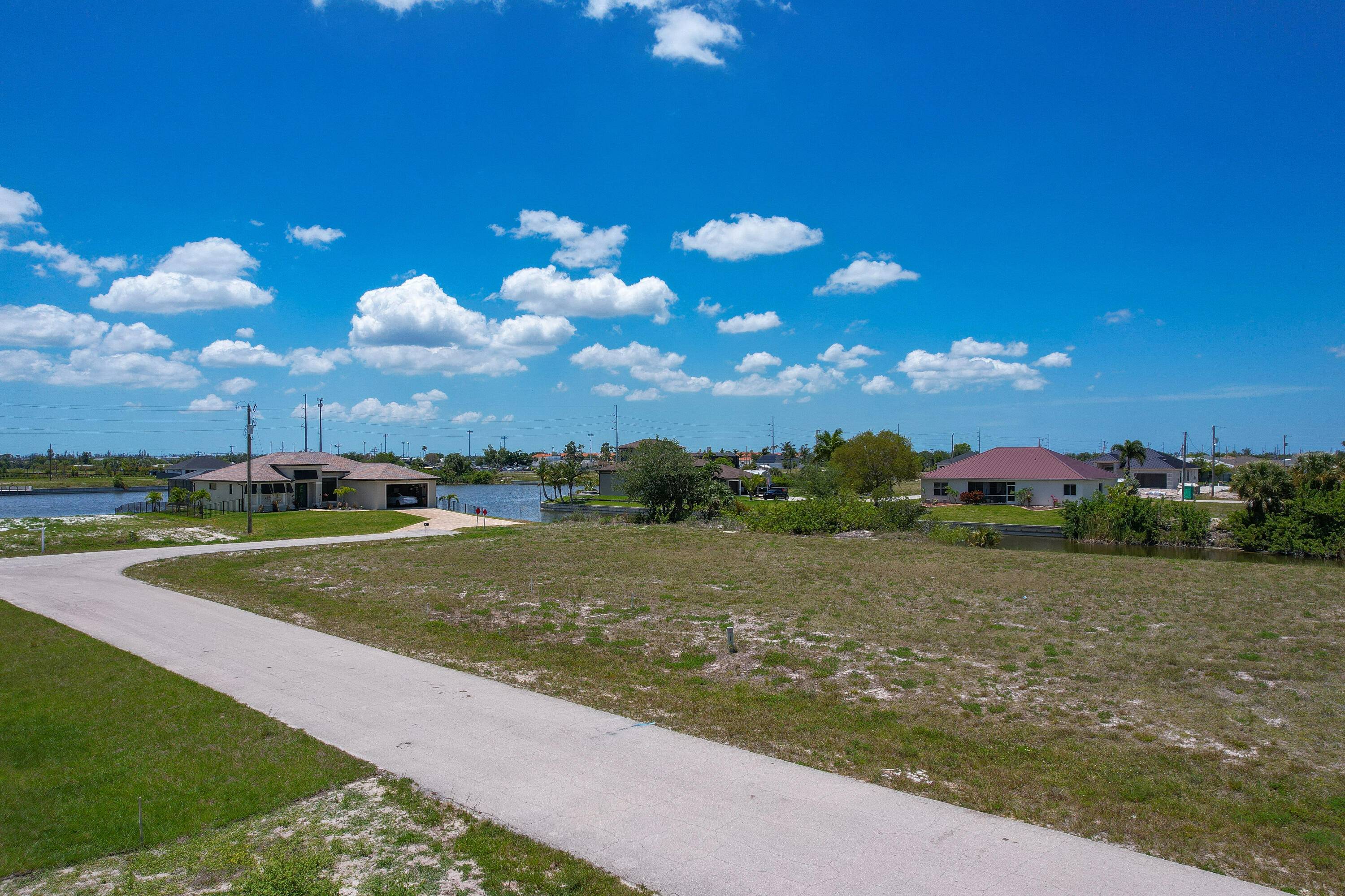 A splendid fresh water canal lot where you can construct your dream home, nestled among newer residences.