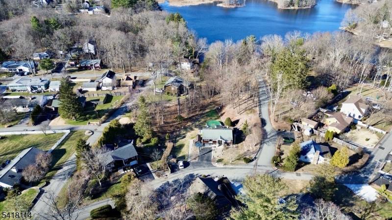 Welcome to this well maintained 3 bedroom, 2 full bath, 1 car garage bi level home nestled in the desirable Lake Swannanoa section of Jefferson Township.