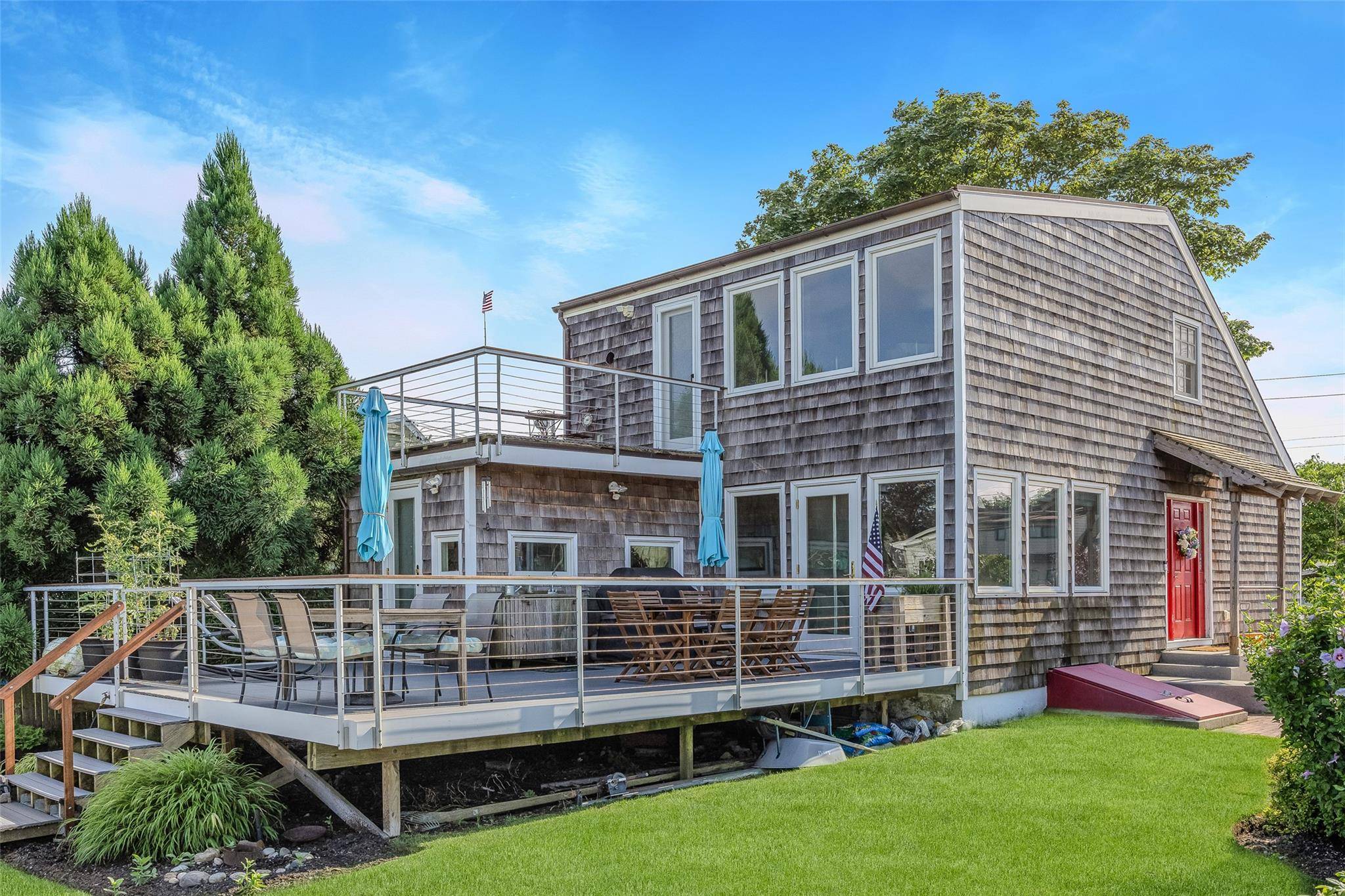 Fall in love with this adorable waterfront cottage offering a rare blend of cozy charm and modern convenience.