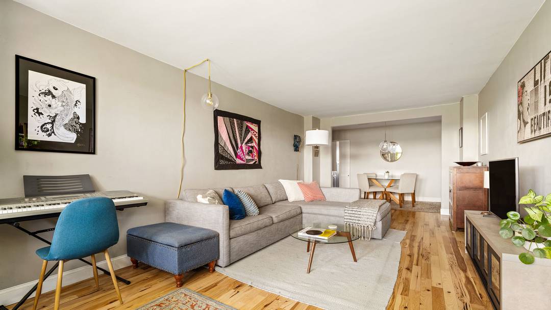 Rare, three bedroom, two bath apartment with a terrace and assigned parking !