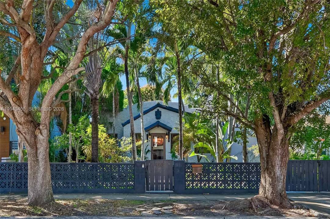 Extremely rare offering in The Roads legal two residence compound minutes from Brickell in one of Miami s most iconic, tree lined neighborhoods.