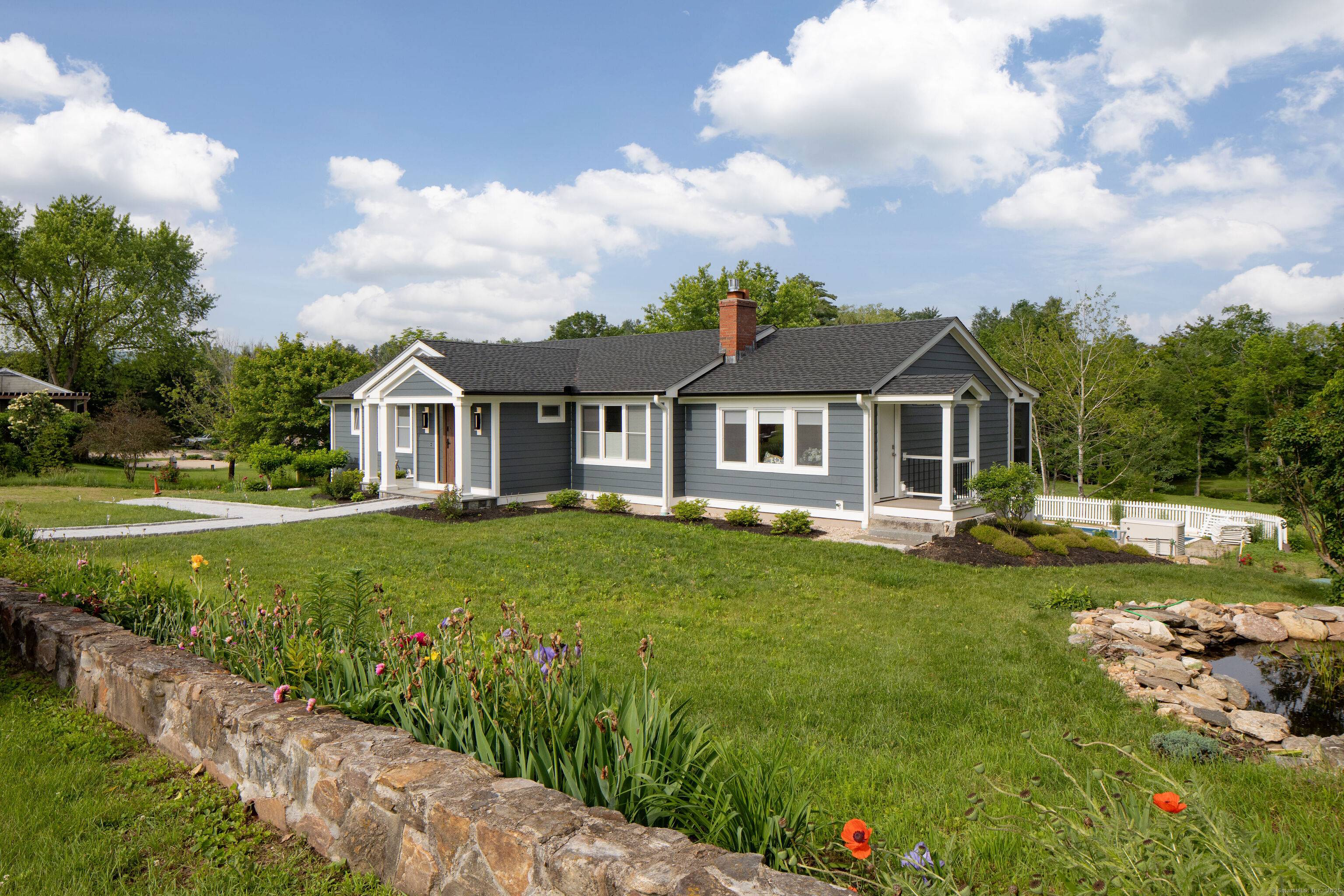 CANAAN VALLEY LUXURY The total renovation of this beautifully located single level home, rebuilt from the foundation up in 2024, has been done with unparalleled taste and style.