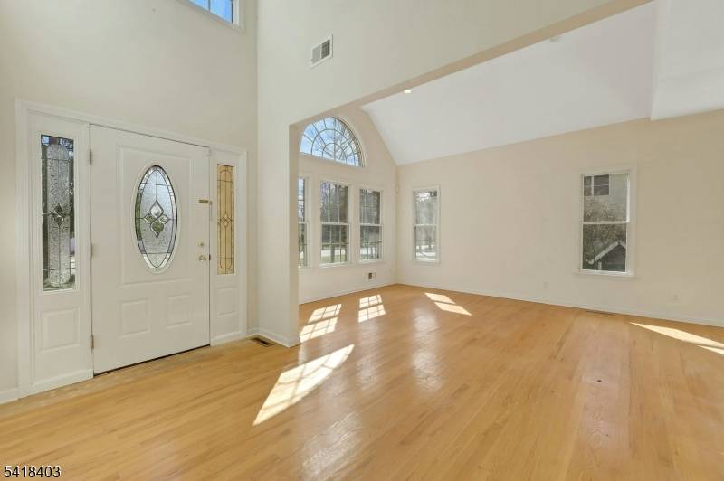 This attractive Colonial home showcases classic design elements and functional room layouts.