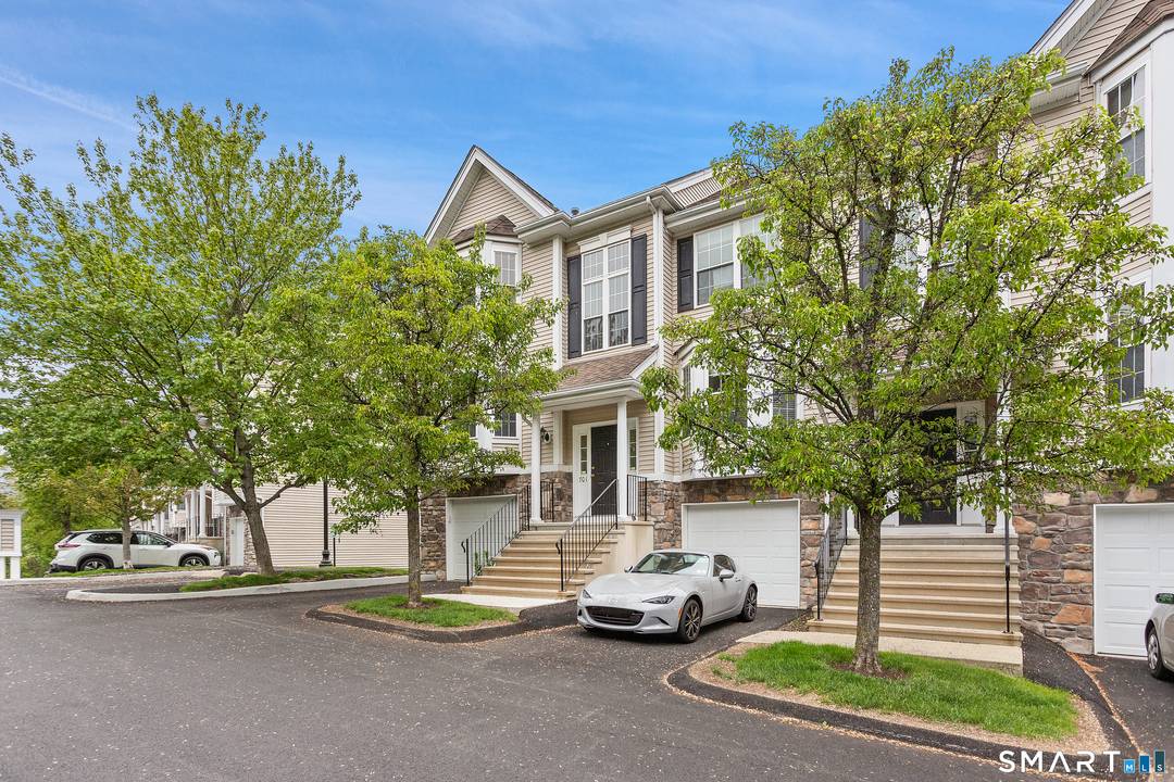Step Right Into the Welcoming Entry Foyer at this Lovely Arlington Woods 2 Bedroom, 2 1 2 Bath End Unit Townhouse with a Finished Walkout Lower Level and 1 Car ...