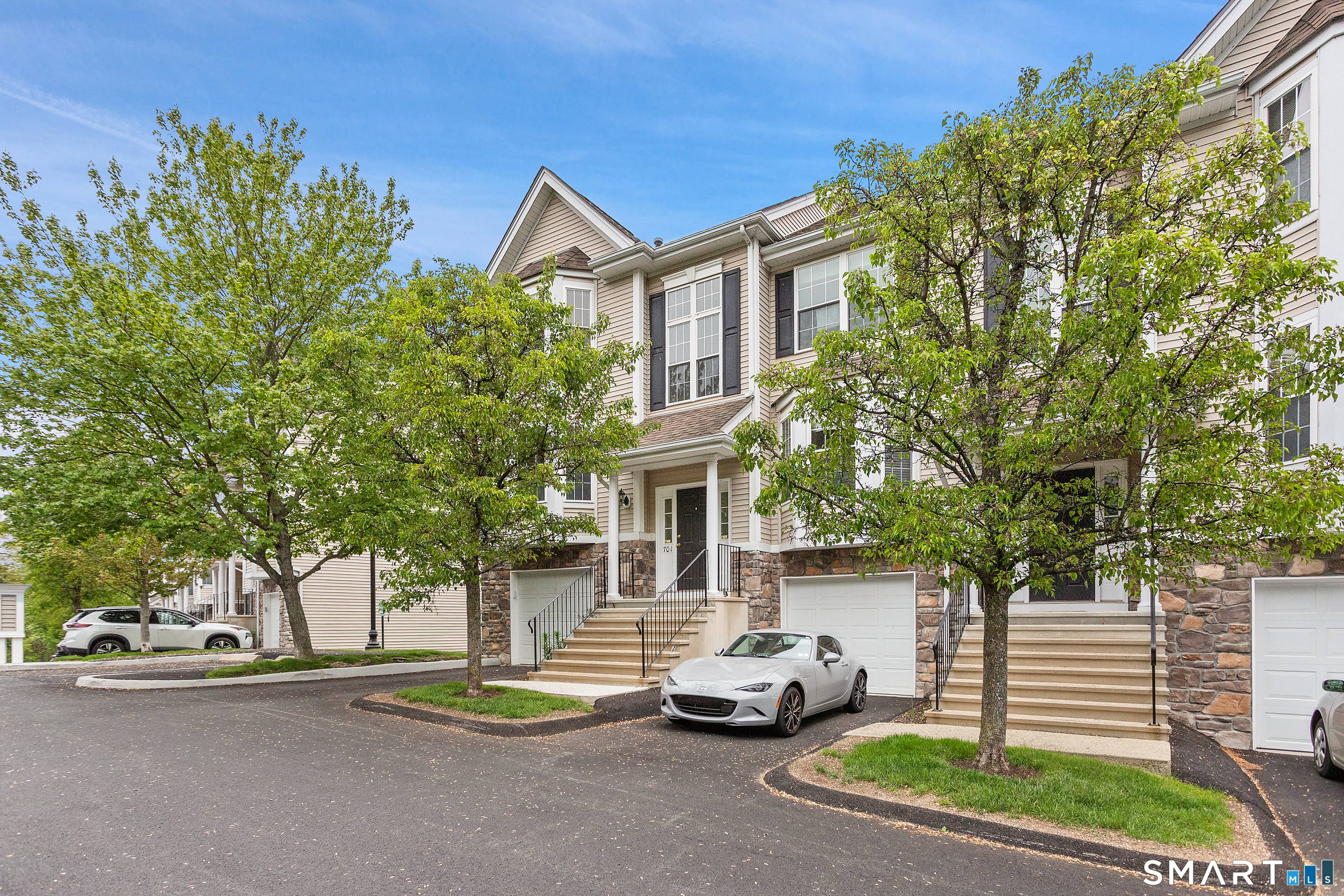 Step Right Into the Welcoming Entry Foyer at this Lovely Arlington Woods 2 Bedroom, 2 1 2 Bath End Unit Townhouse with a Finished Walkout Lower Level and 1 Car ...