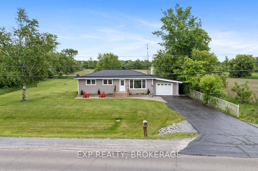 Welcome to 5086 Highway 38, a nicely updated bungalow set on a half acre lot in Harrowsmith, just steps from the park and local shops.