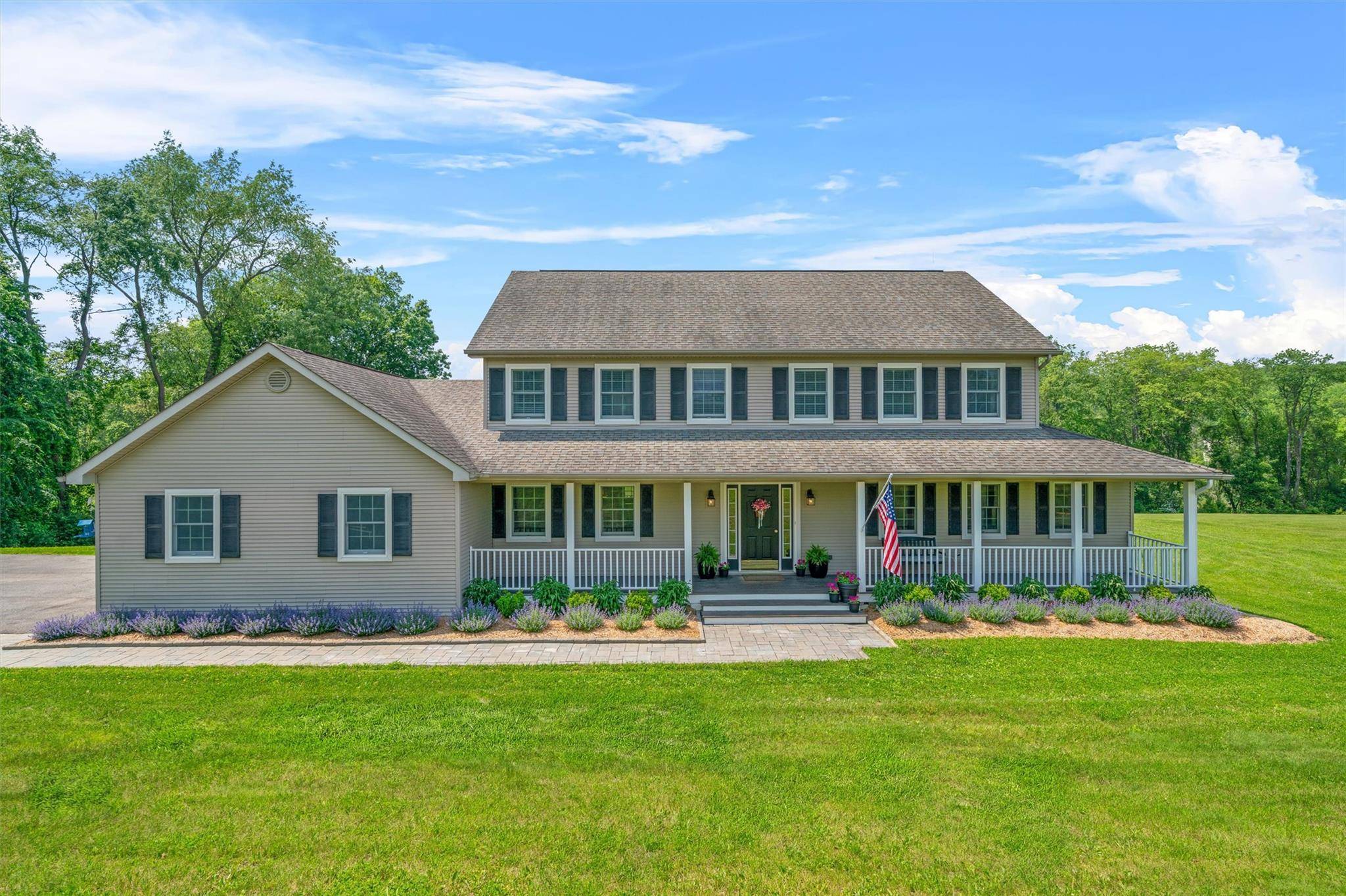 Nestled on a quiet, tree lined street in the coveted Tranquility Estates of Hamptonburgh, this beautifully maintained 4 bedroom, 3.