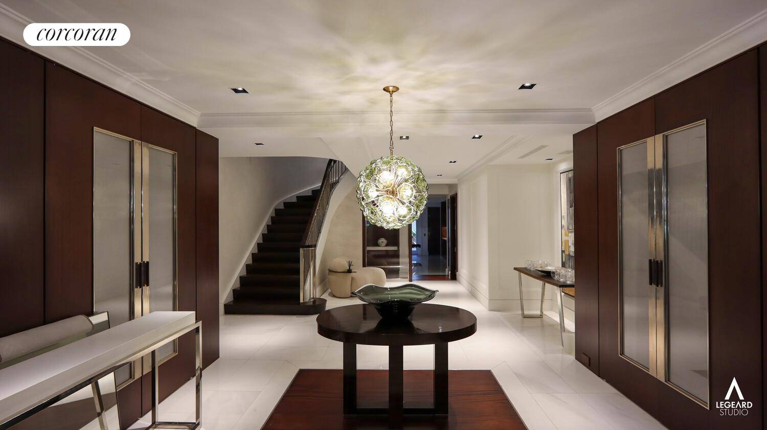 46 East 66th Street Townhouse This pristine, 20 foot wide townhouse is tucked away in one of Manhattan's most coveted locations, between Madison and Park avenueson the Upper East Side.