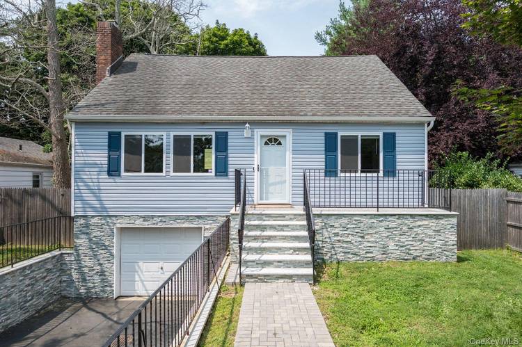Welcome to this fully updated and spacious 4 bedroom, 3 bathroom home in a prime Northport location.