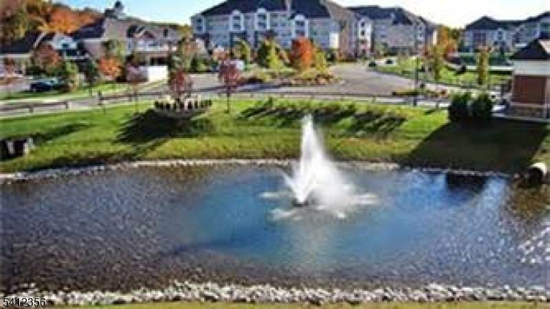 One of the Most Desirable Buildings steps from the Clubhouse.