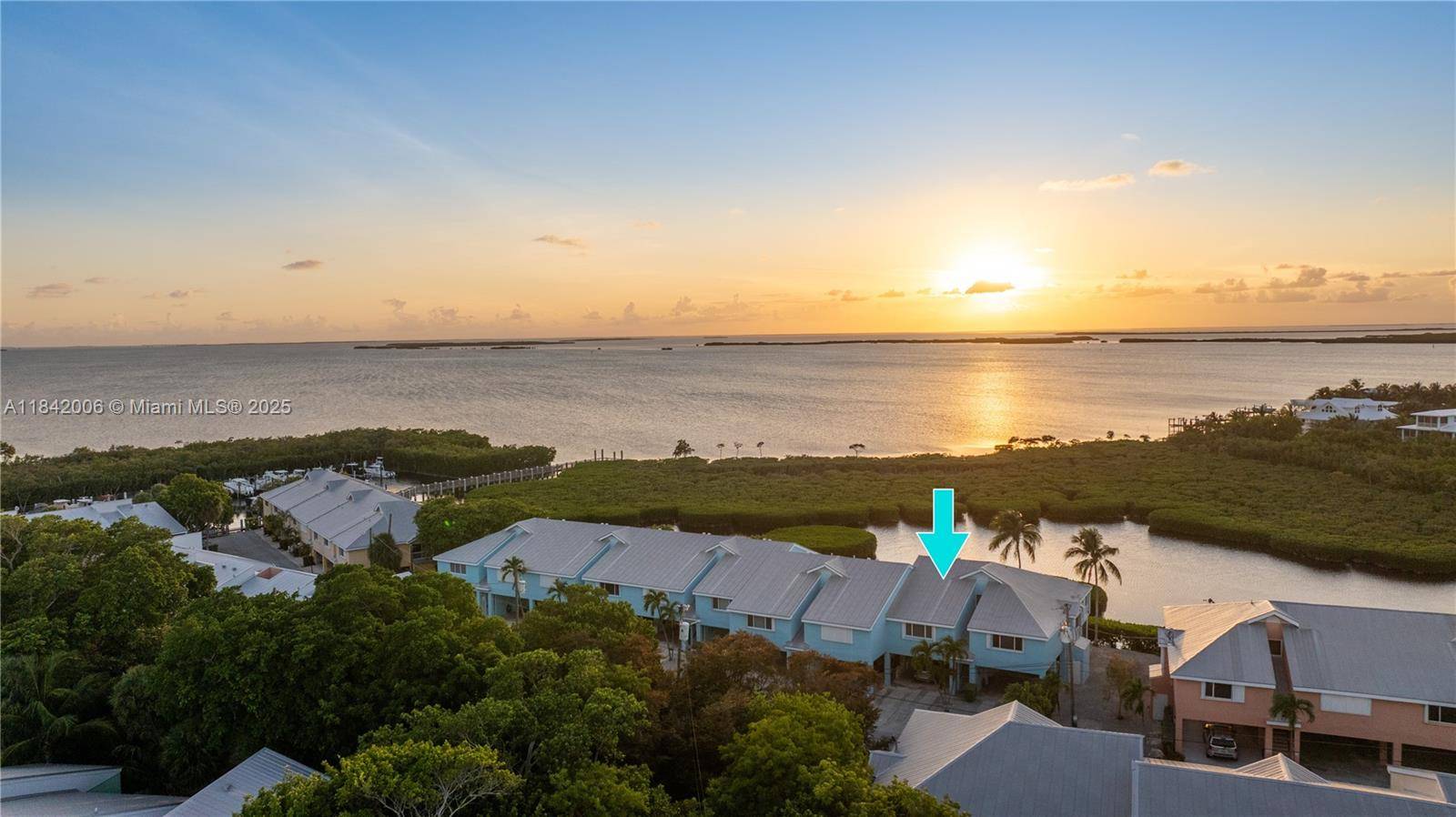 Introducing this stunning 2 bedroom, 2 bathroom townhouse that boasts spectacular views of the Florida Bay, where breathtaking sunsets turn your evenings into a magical experience.