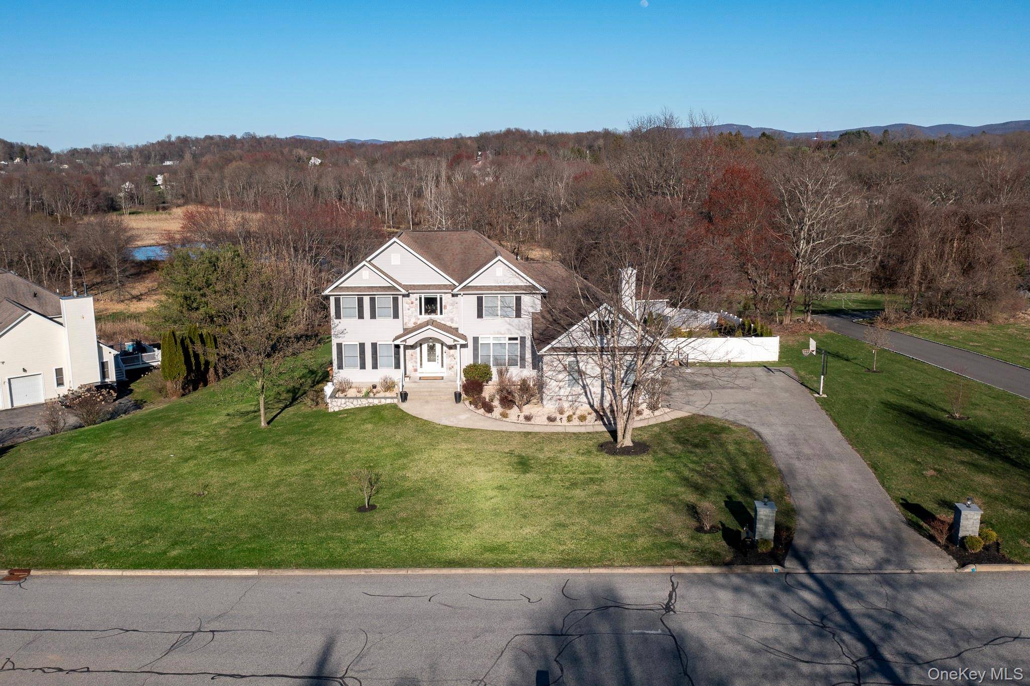 Welcome to this stunning 3, 065 square foot estate, nestled on 1.