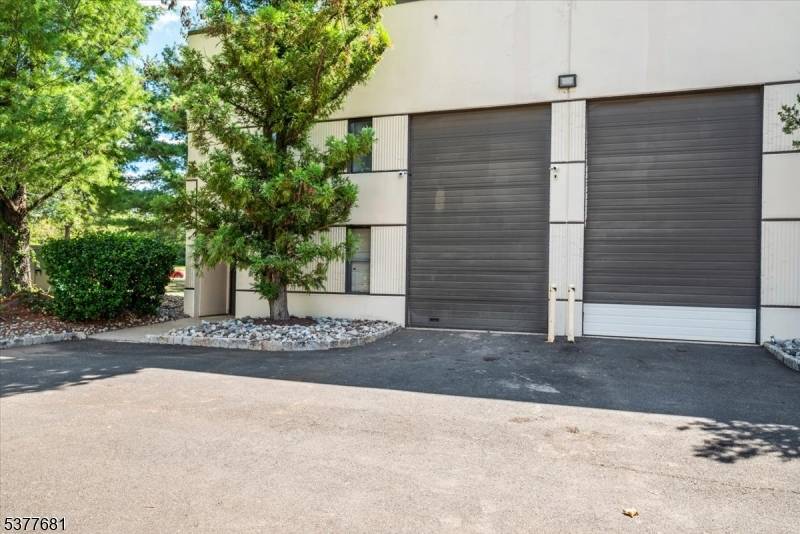 UNBELIEVABLE 2, 350 SF INDUSTRIAL CONDO FOR SALE, 1ST FLOOR CONTAINS 1, 800 SF OF MOSTLY OPEN SPACE WITH 15' OVERHEAD DOOR, 16' CEILINGS, RECEPTION AREA AND RESTROOM.